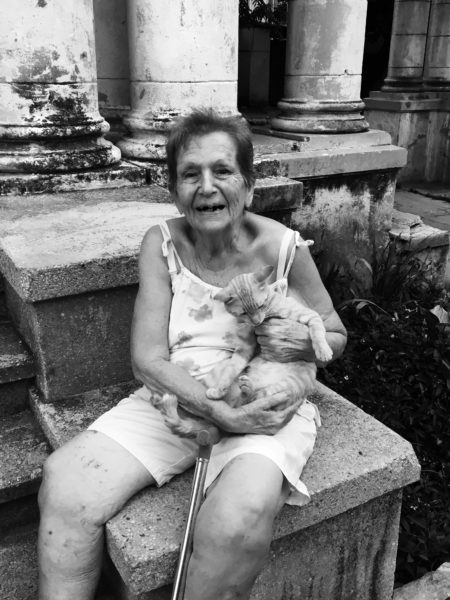 Cuban woman and her cat.